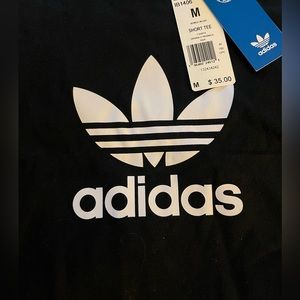 Adidas Women’s T shirt medium